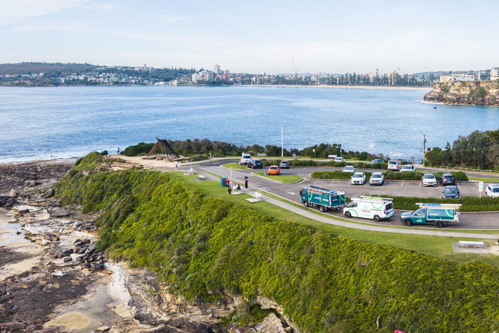 The Infinite Electrical & Solar fleet at Freshwater Headland, from the air