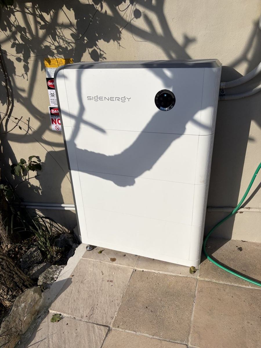 Sigenergy SigenStor home battery installed outdoors by Infinite Electrical & Solar