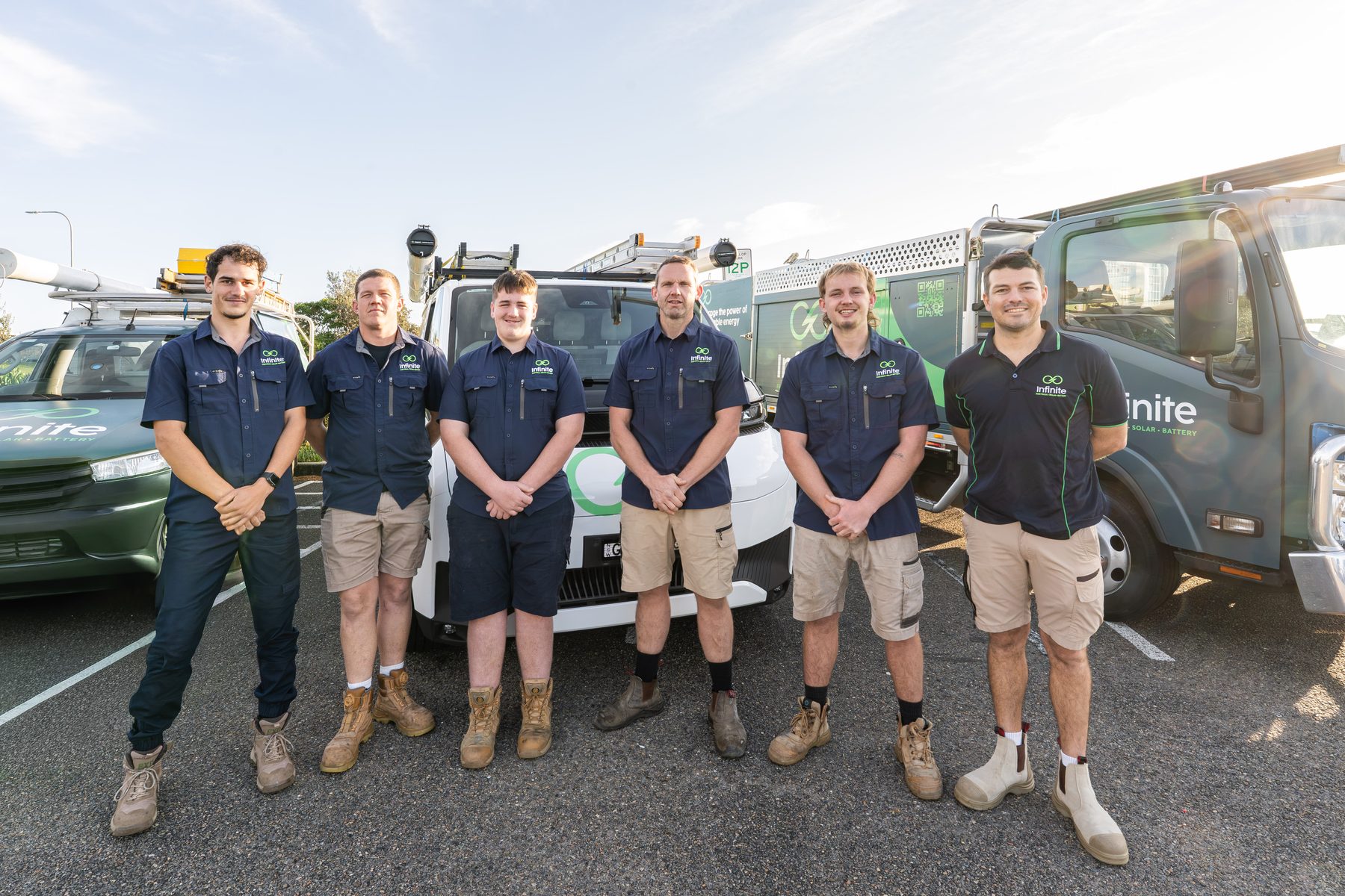 The Infinite Electrical & Solar crew and fleet vehicles at Freshwater Headland, Northern Beaches