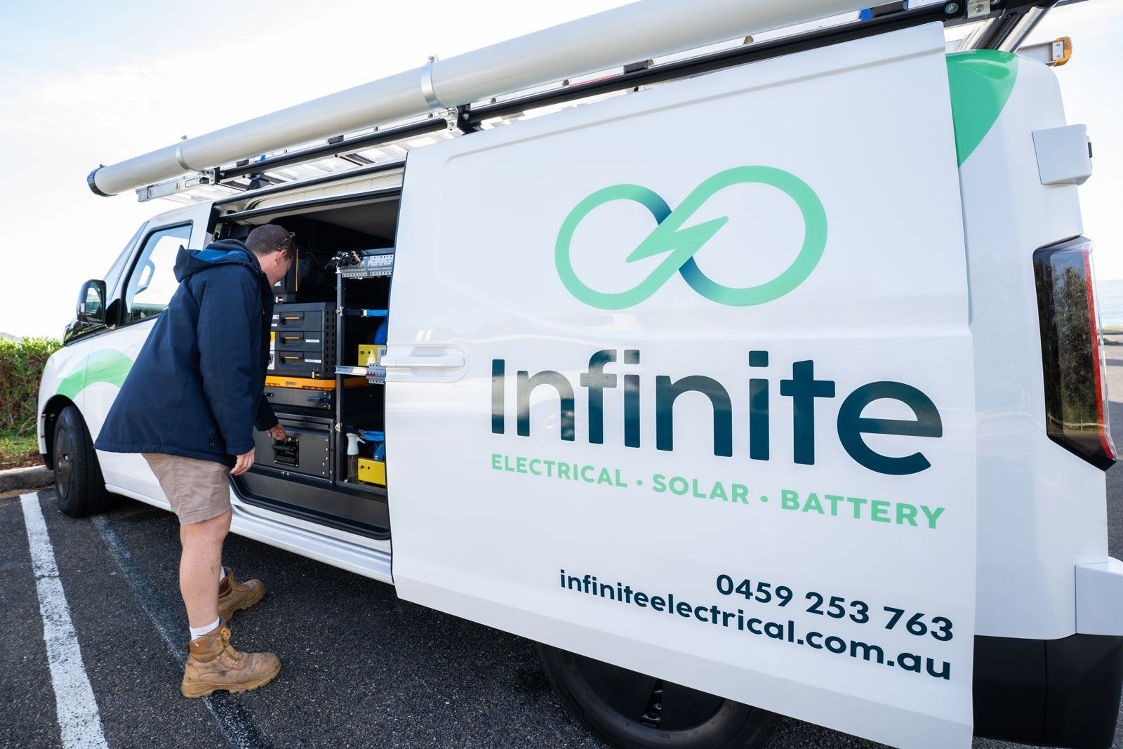 An Infinite Electrical & Solar electrician at the van, Freshwater Headland